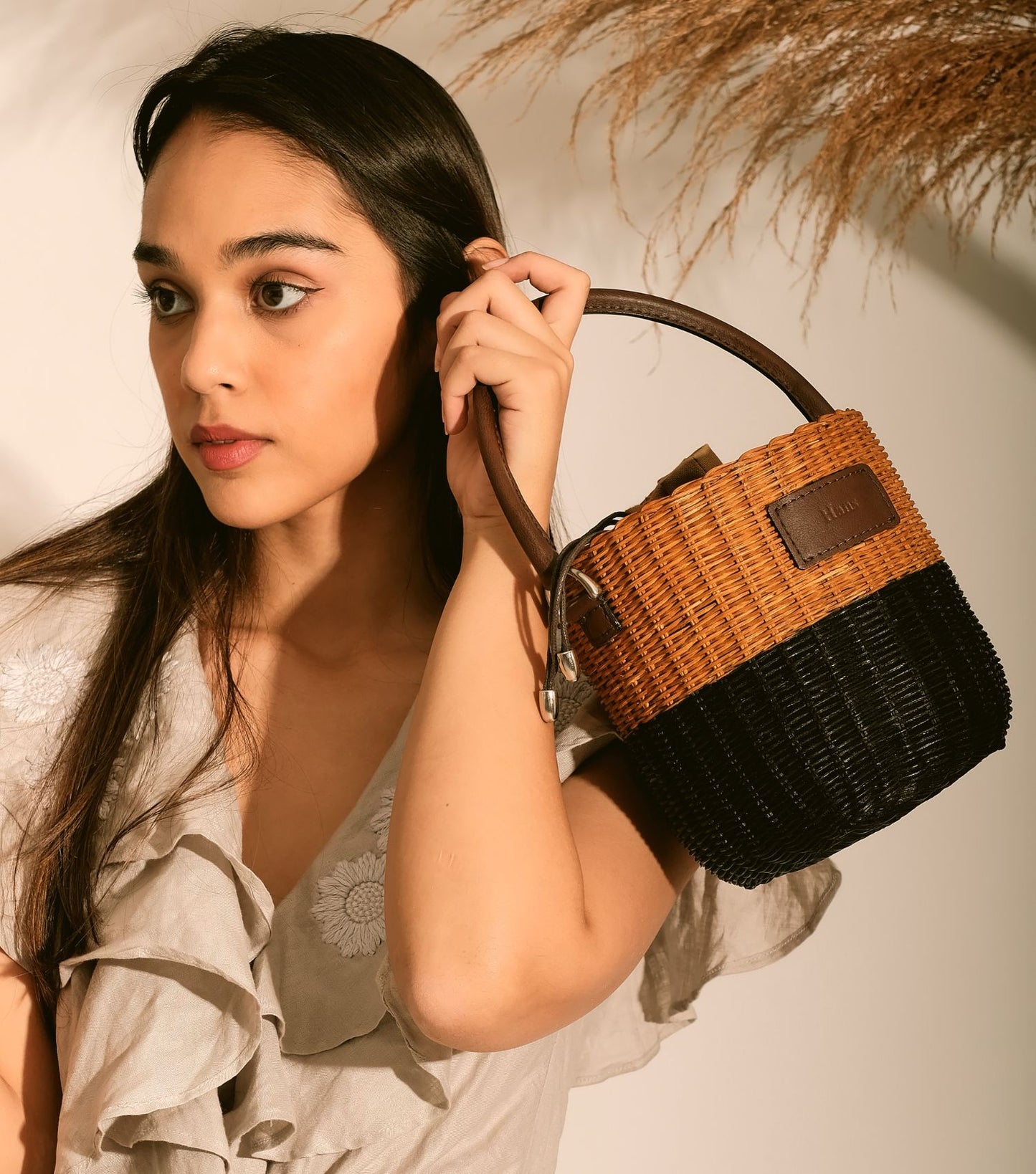 Model with Nico Bucket Sling